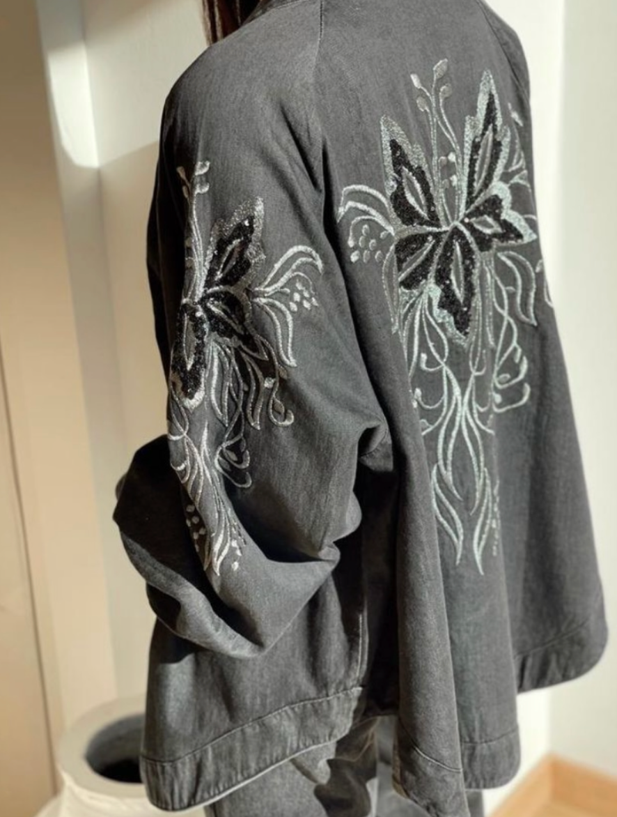 Denim cardigan with handmade stitches