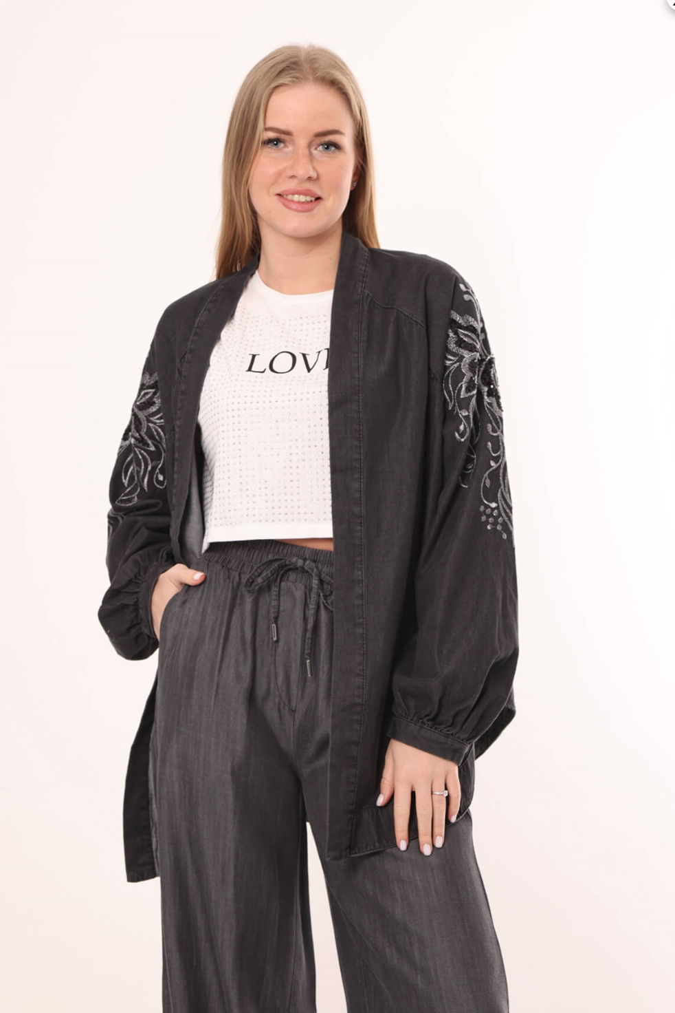 Denim cardigan with handmade stitches