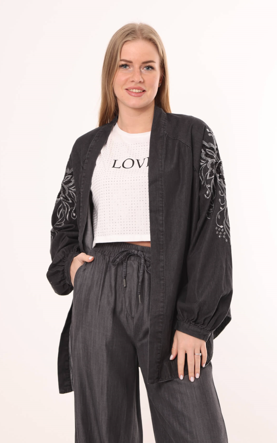 Denim cardigan with handmade stitches